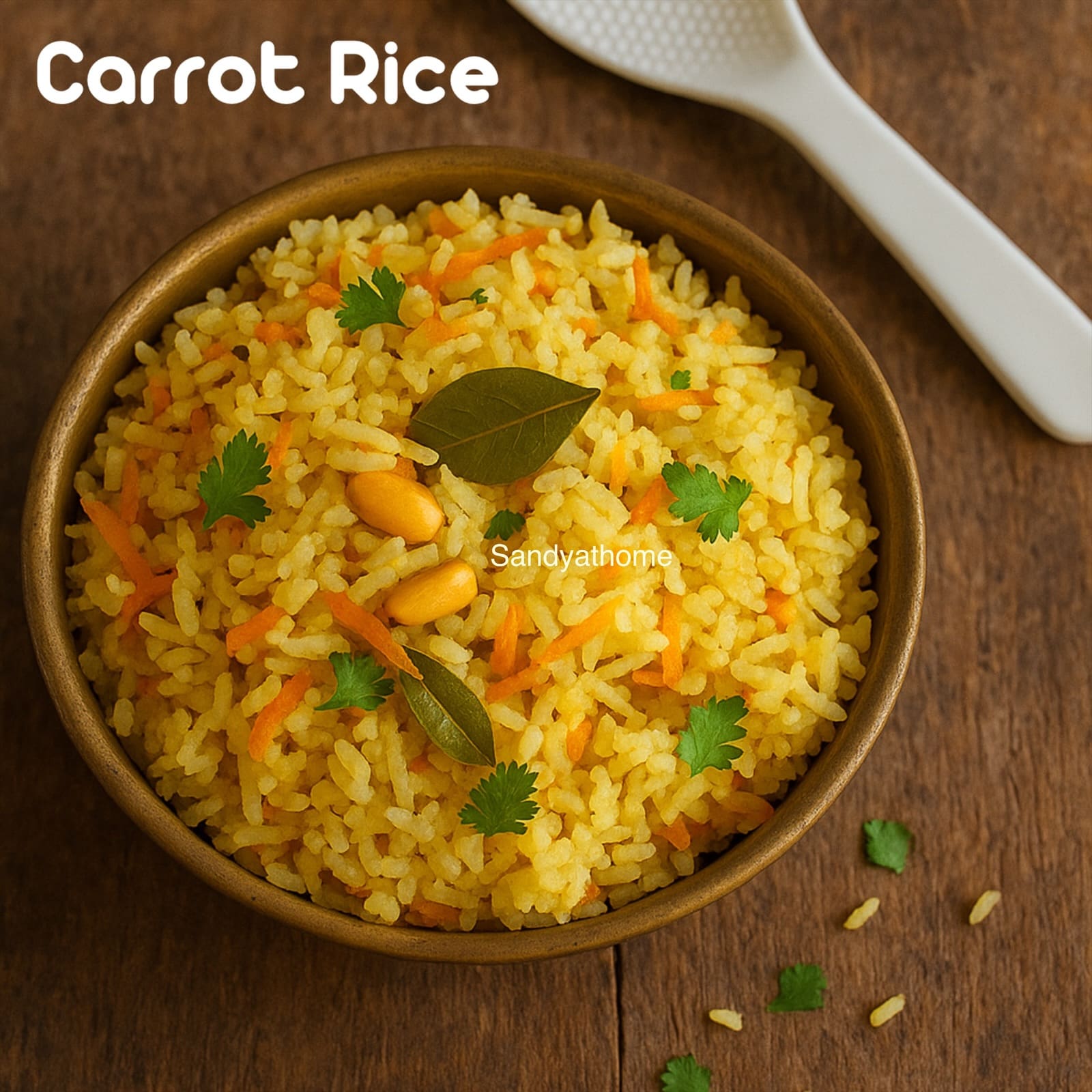 A rustic bowl of South Indian carrot rice made with grated carrots, peanuts, fluffy rice, and fresh cilantro, served on a wooden backdrop — a vibrant vegetarian lunch dish