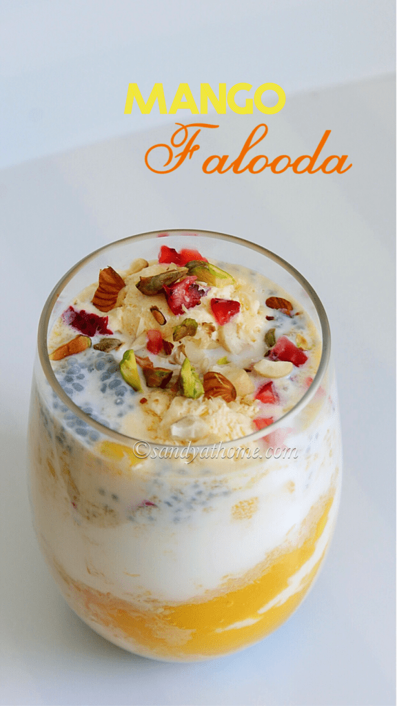 Royal mango falooda with mango puree, sweetened milk, and summer toppings