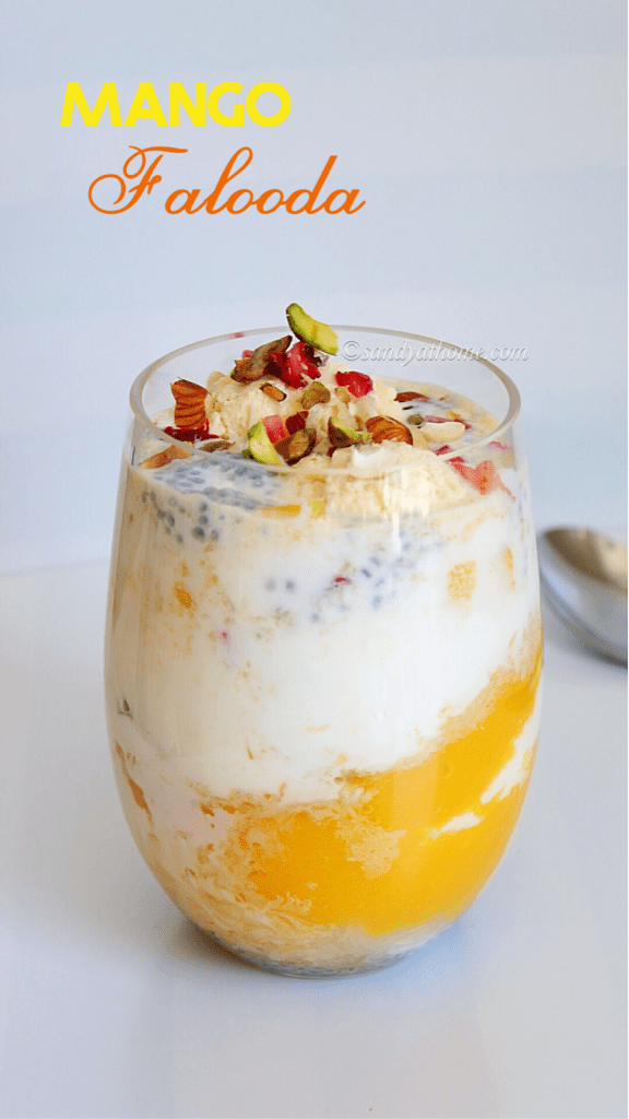 Mango falooda dessert with sabja seeds, falooda sev, and vanilla ice cream