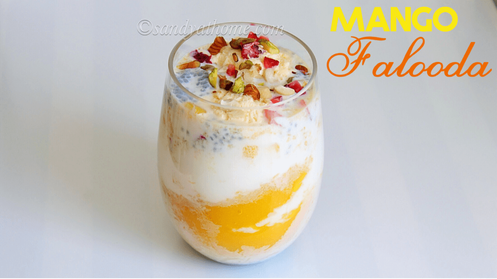 Close-up of Indian mango falooda with ice cream, nuts, and basil seeds
