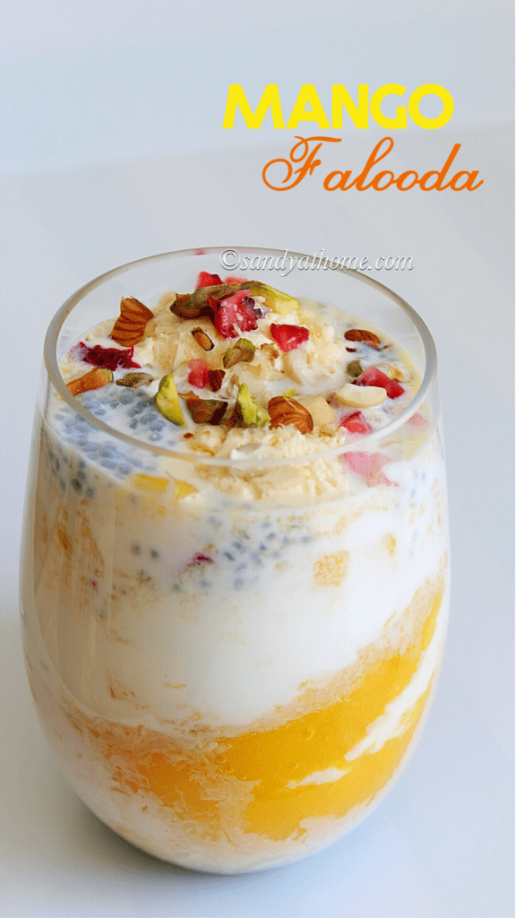 Refreshing summer mango dessert – falooda with mango chunks and cherry on top