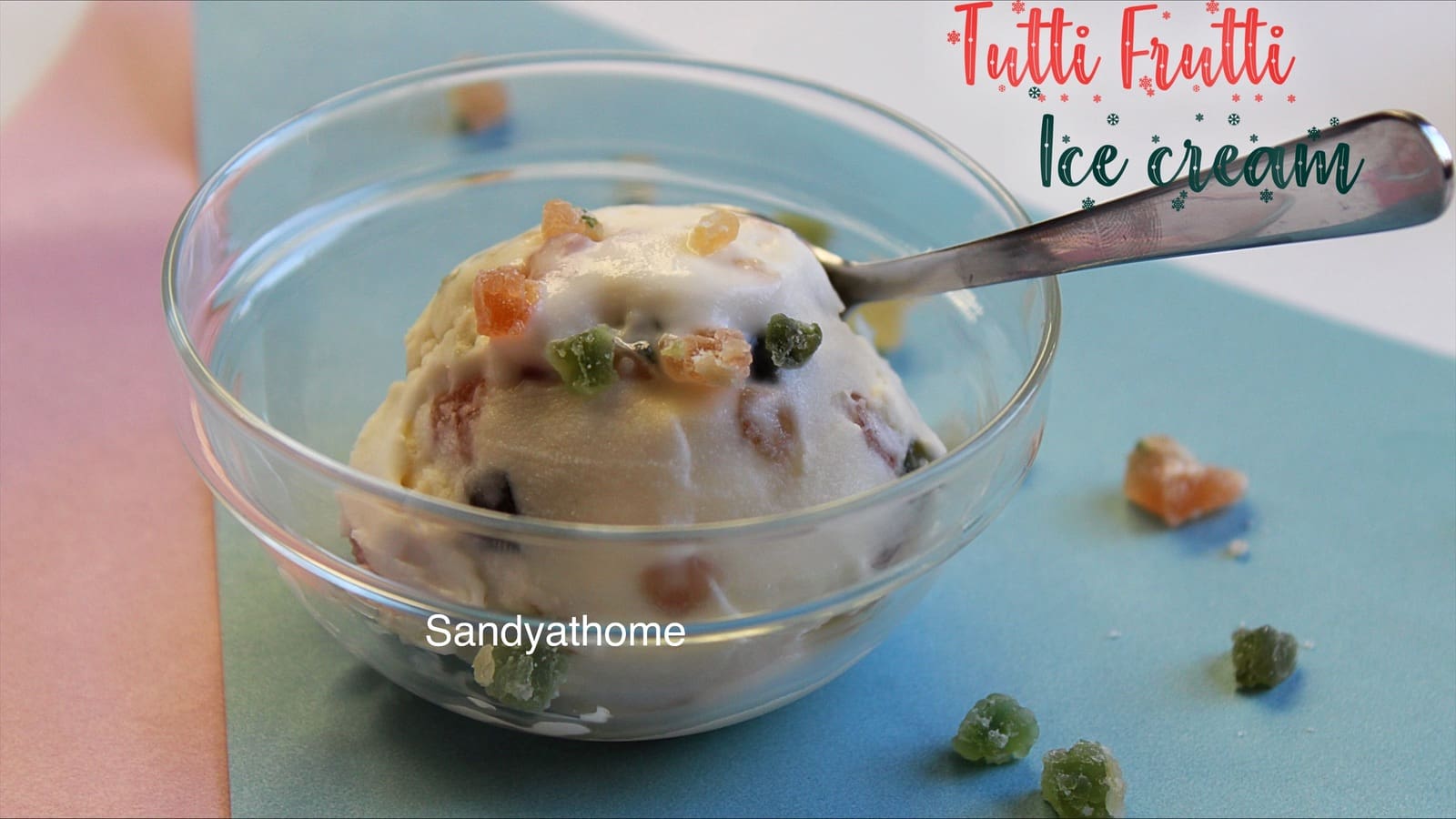 Creamy tutti frutti ice cream scooped using an ice cream spoon, set against a summer backdrop