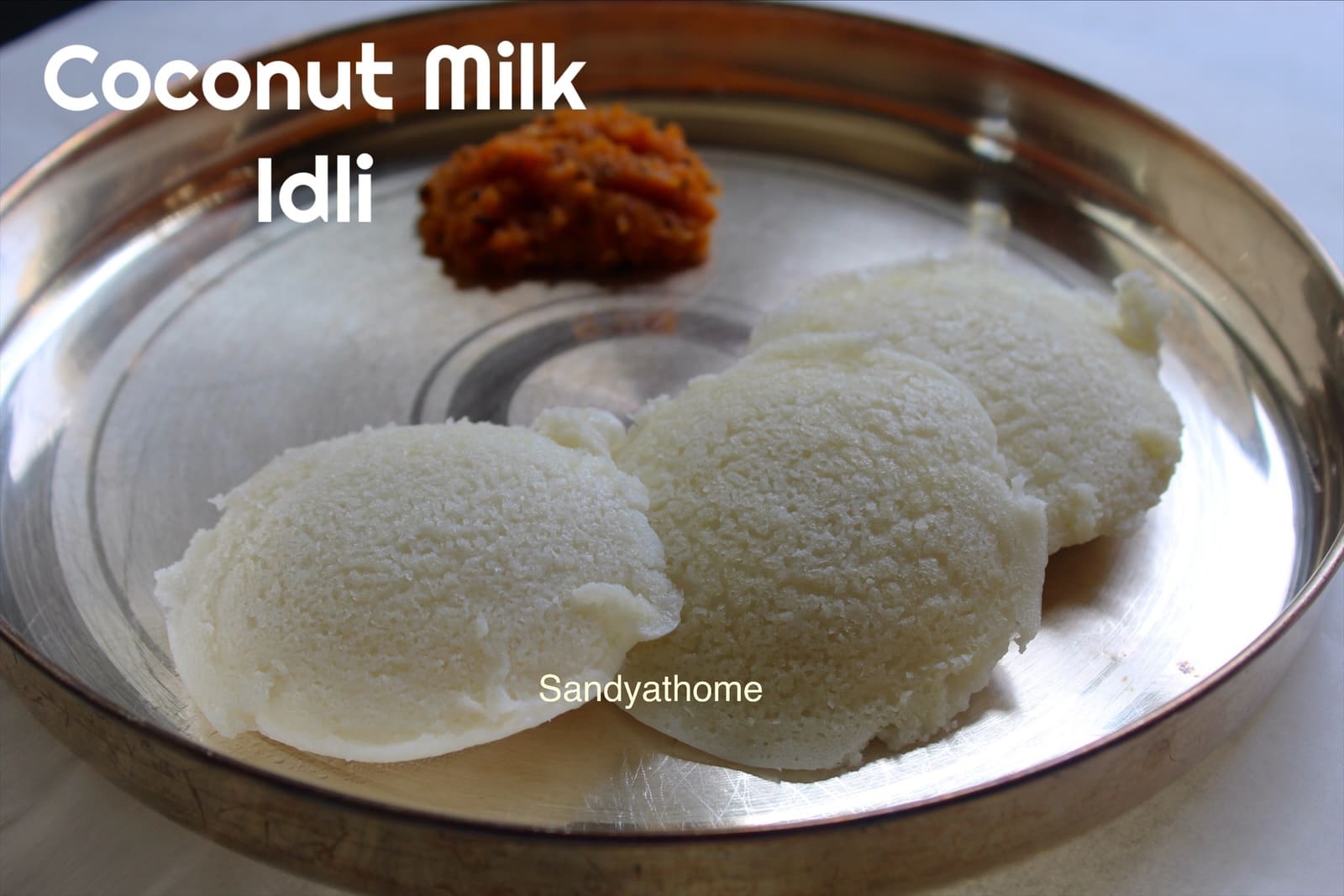 Steamed coconut milk idlis with fresh coconut chutney on the side
