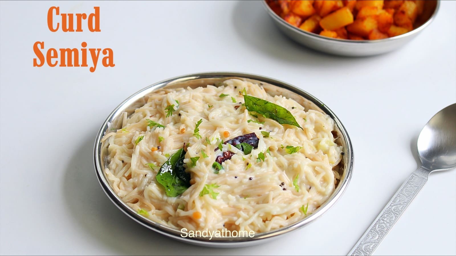 Traditional Thayir Semiya served in a brass bowl with curd, tempered spices, and coriander – a Tamil revival recipe