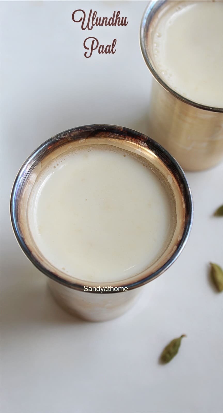 Traditional Tirunelveli-style Ulundhu Paal made with white urad dal, coconut milk, and jaggery, served warm in a brass bowl