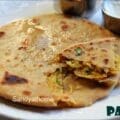 Gobi paratha recipe with cooked cauliflower stuffing, served hot on a plate