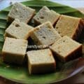Millet cake made without maida or wheat, sliced and served on a banana leaf.