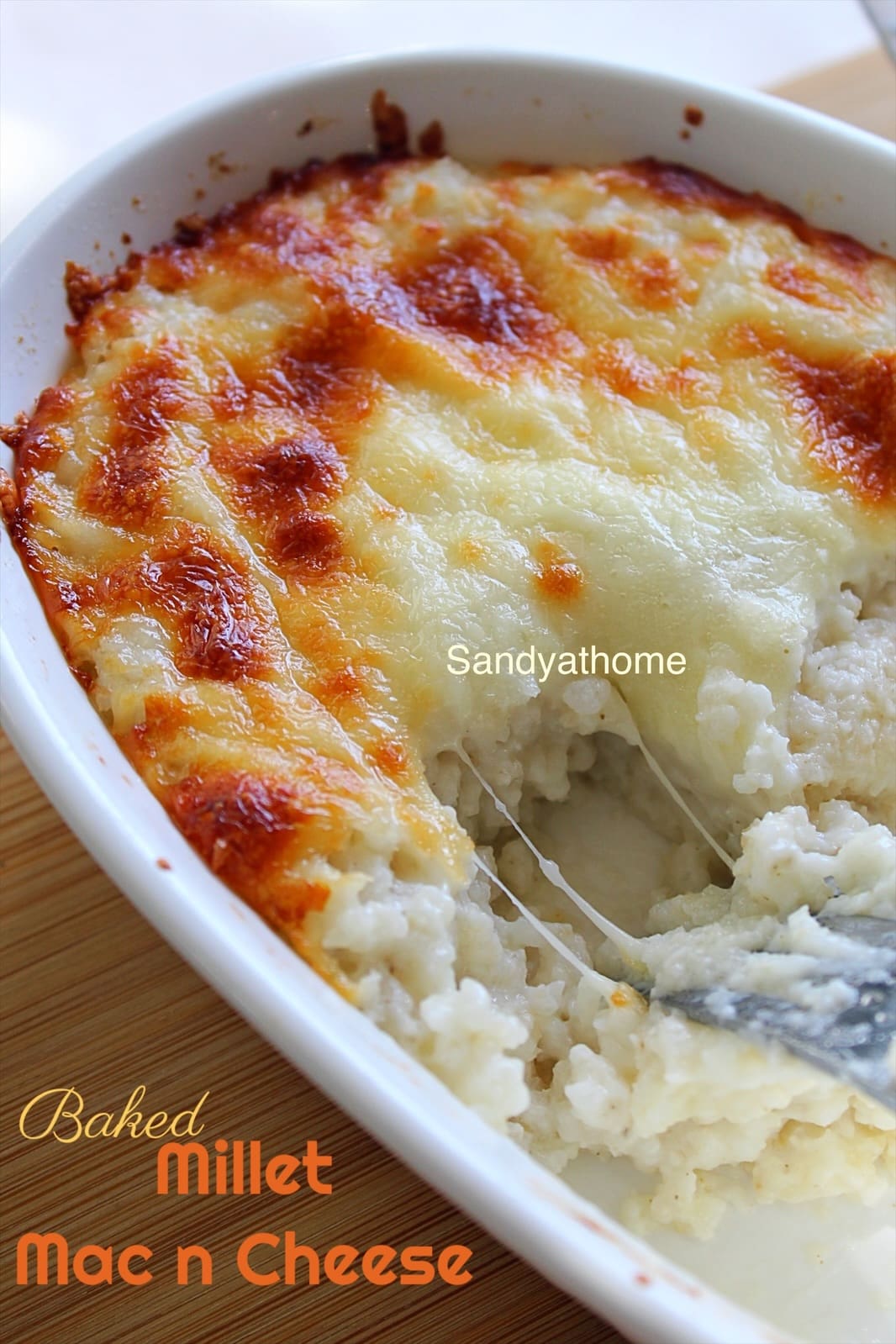 Comfort food bowl of millet mac and cheese by Sandyathome, featuring cooked little millet in a creamy cheese sauce.
