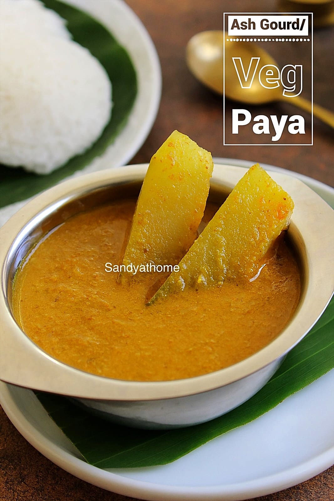 A bowl of poosanikai paya in thin coconut gravy, styled revival-style with ash gourd wedges and idiyappam on the side – Sandyathome presentation.