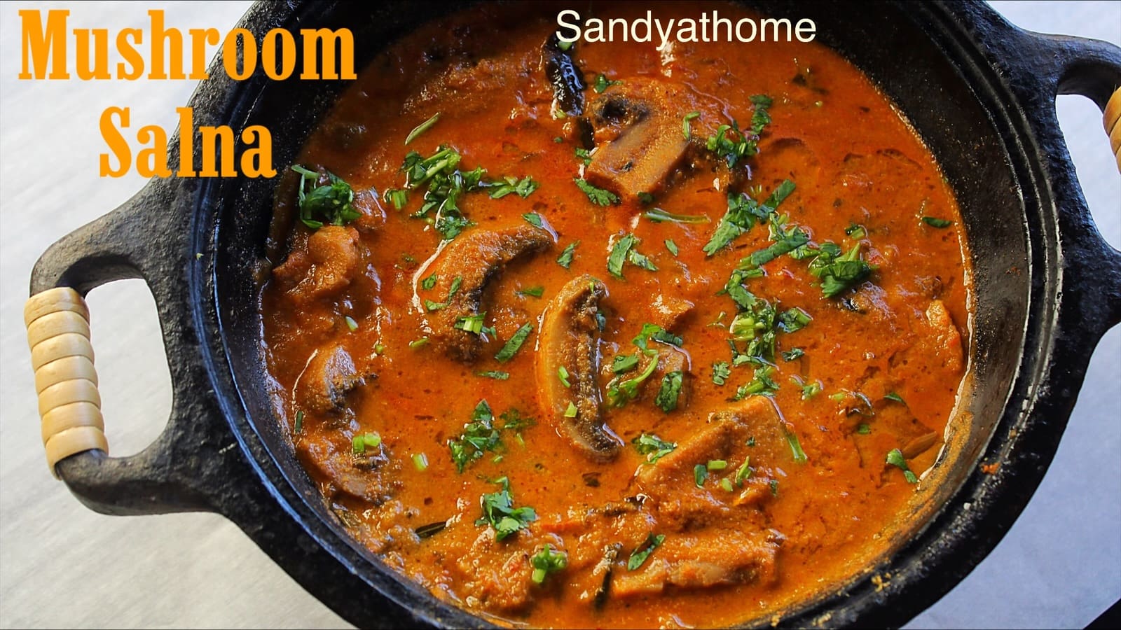 Easy mushroom salna served with soft idiyappam on banana leaf – Tamil street food-inspired vegetarian gravy.