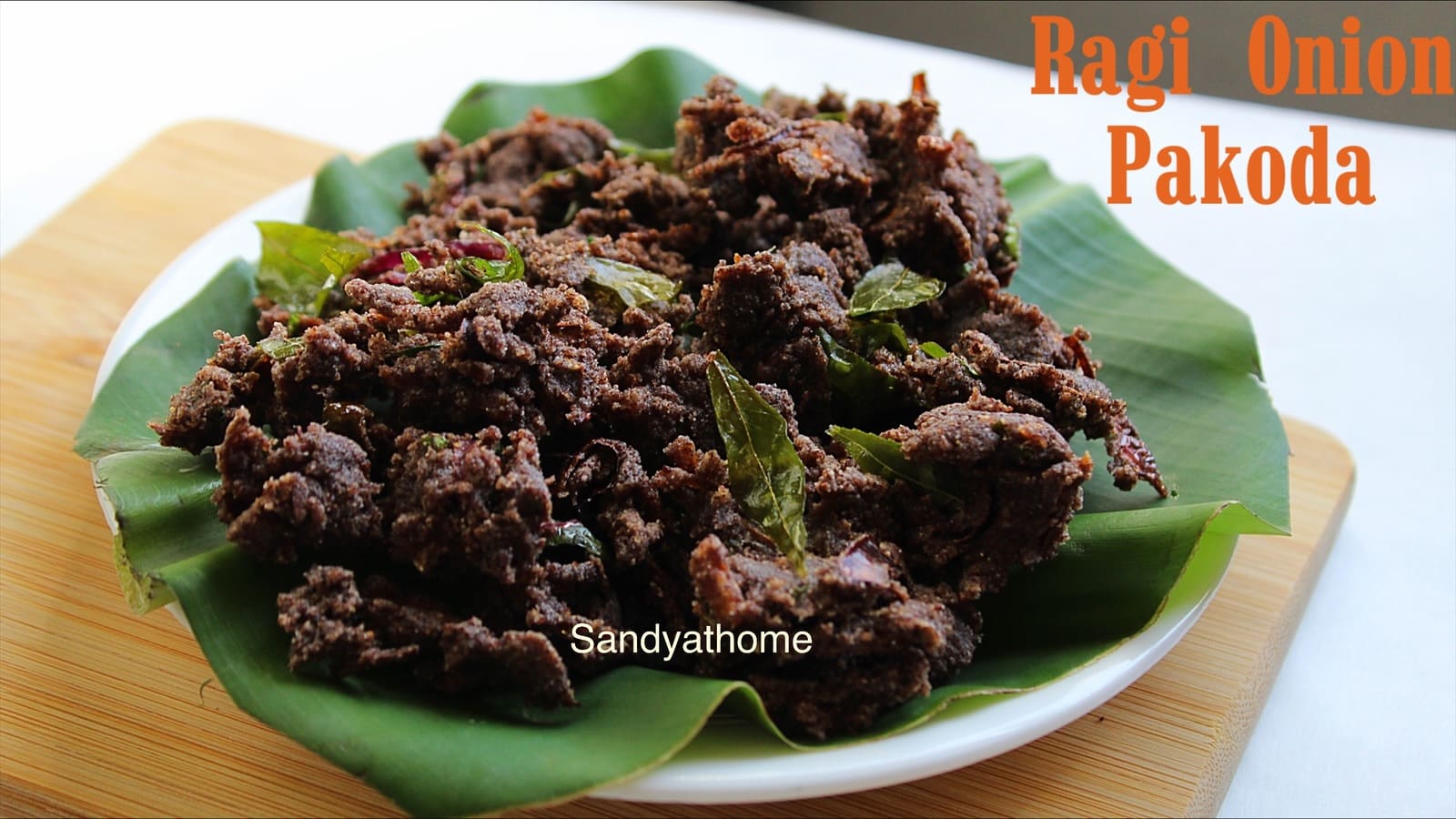 Gluten-free ragi flour pakoda with crunchy onion and spice — an easy Indian snack made with finger millet and no gram flour.