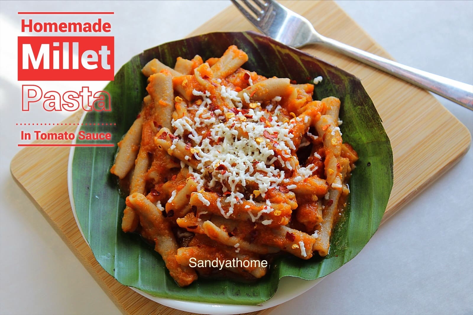 Handmade millet pasta called Millet Foldies made from little millet and wheat flour, shaped using a skewer and served with Indian-style tomato sauce — a revival recipe from Sandyathome featuring gluten-free, healthy, millet pasta from scratch.