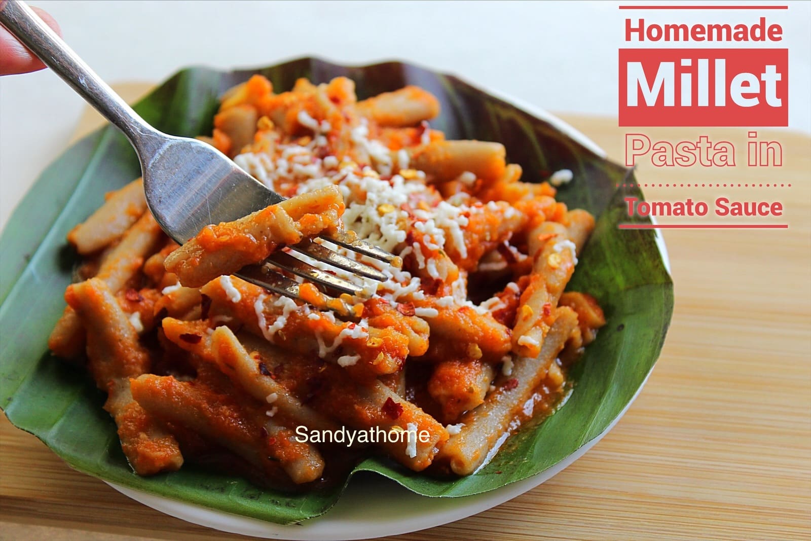 Handmade millet pasta called Millet Foldies made from little millet and wheat flour, shaped using a skewer and served with Indian-style tomato sauce — a revival recipe from Sandyathome featuring gluten-free, healthy, millet pasta from scratch.