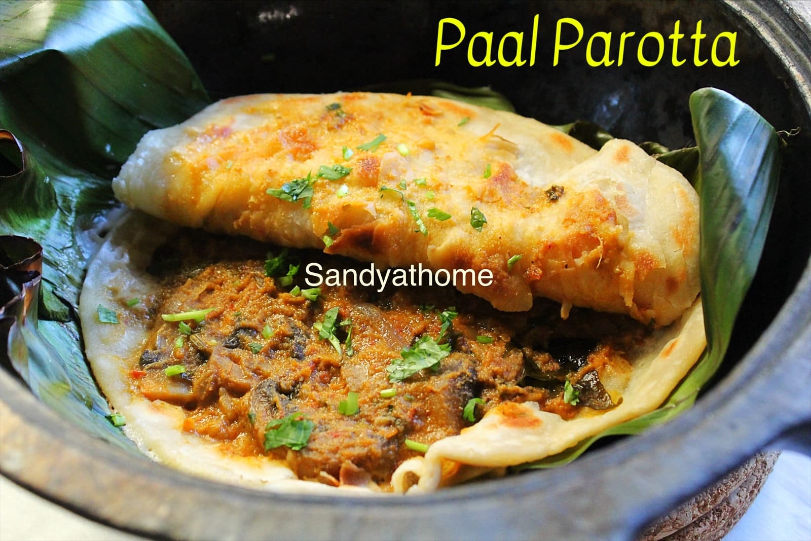 Viral veg paal parotta recipe made with parotta and coconut gravy in a traditional setup.