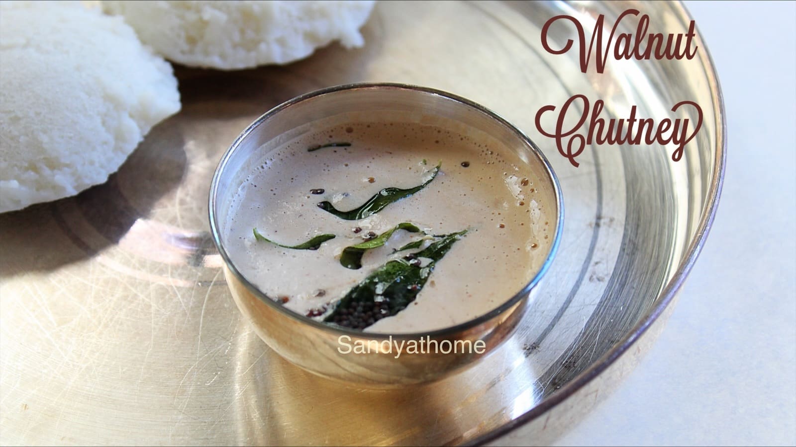 A creamy South Indian-style walnut chutney served with soft idli and crispy dosa, made without peanut or coconut – a perfect summer chutney recipe.