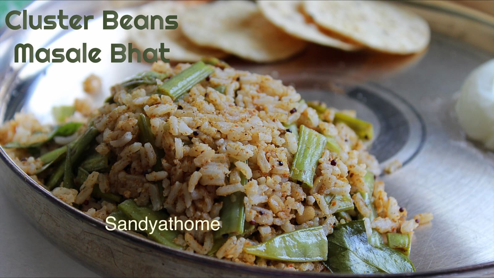 Authentic Maharashtrian cluster beans masala bhat made with fresh coconut goda masala, served hot as a flavorful rice dish.