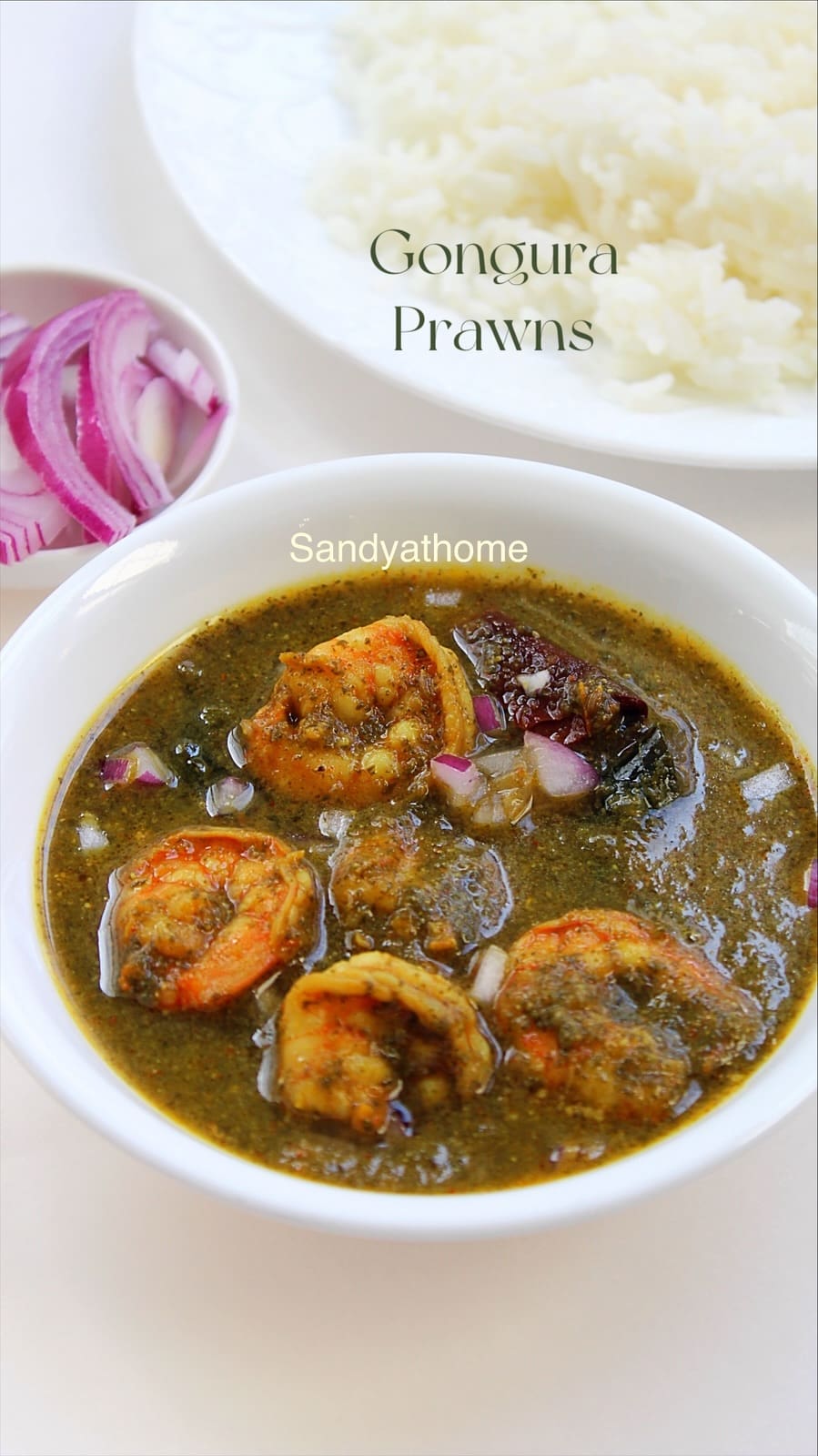 Authentic gongura royyalu curry with prawns and red-stem sorrel leaves in spicy Andhra gravy.