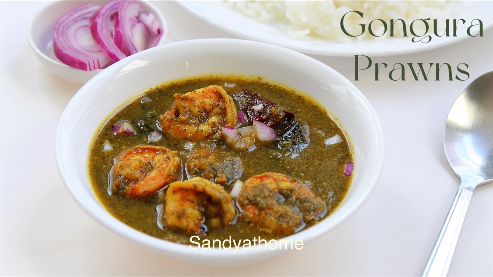 Traditional Andhra shrimp curry with gongura, chilies, and garlic for a rustic, flavorful dish