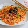 Easy Korean–Indian fusion dish of kimchi fried rice with basmati rice, vegetables, and seaweed topping.