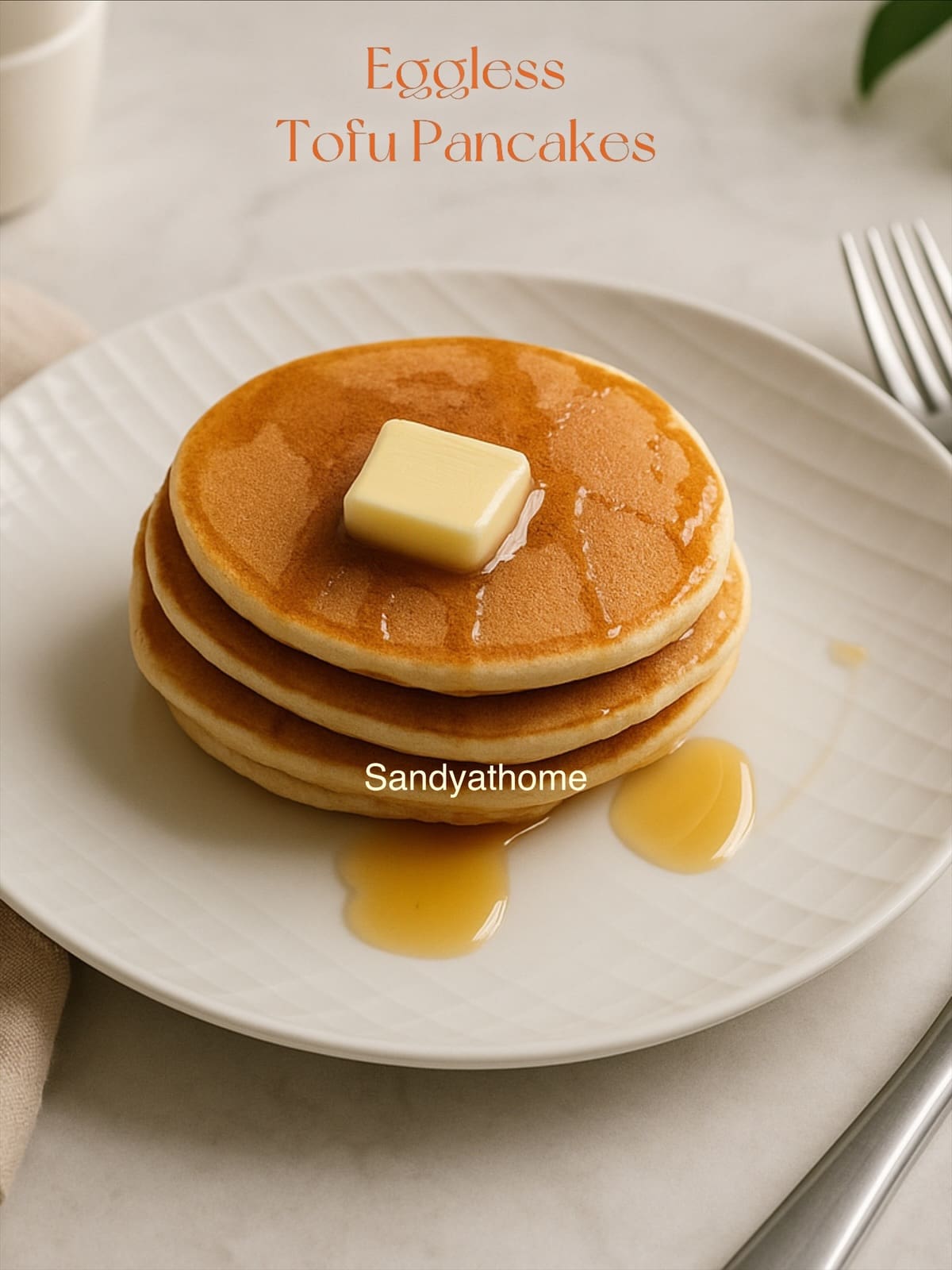 Eggless tofu pancakes made with whole wheat and all-purpose flour, served with fresh berries for a nutritious breakfast recipe.